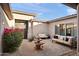 Inviting courtyard featuring a fountain and seating area at 12544 N 120Th Pl, Scottsdale, AZ 85259