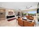 Open living area with large windows and access to a patio at 12544 N 120Th Pl, Scottsdale, AZ 85259