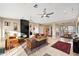 Bright living room featuring a fireplace and comfortable seating at 12544 N 120Th Pl, Scottsdale, AZ 85259