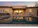 Inviting pool and patio with fire pit and seating area at 12544 N 120Th Pl, Scottsdale, AZ 85259