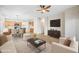 Open concept dining area adjacent to the kitchen and living room at 12548 W Monterosa St, Litchfield Park, AZ 85340