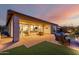 Extended patio with comfortable seating and a view of the living area at 13162 W Duane Ln, Peoria, AZ 85383