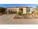 Single-story home with desert landscaping and two-car garage at 13162 W Duane Ln, Peoria, AZ 85383