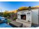 Charming outdoor fireplace perfect for relaxing evenings at 13162 W Duane Ln, Peoria, AZ 85383