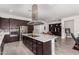 Modern kitchen with large island and stainless steel appliances at 13162 W Duane Ln, Peoria, AZ 85383