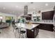 Modern kitchen with large island and stainless steel appliances at 13162 W Duane Ln, Peoria, AZ 85383