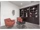Cozy library with built-in shelving and comfortable seating at 13162 W Duane Ln, Peoria, AZ 85383