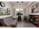 Office space with futon, shelving, and window at 13162 W Duane Ln, Peoria, AZ 85383