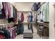 Large walk-in closet with ample shelving and hanging space at 13162 W Duane Ln, Peoria, AZ 85383