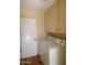 Laundry room with washer, dryer, and additional storage at 13808 N Silverbell Dr, Sun City, AZ 85351