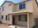 House with covered patio and desert landscaping at 14737 N 174Th Dr, Surprise, AZ 85388