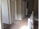 Upstairs hallway with carpet and doors to bedrooms at 14737 N 174Th Dr, Surprise, AZ 85388