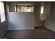 Spacious living room with carpet and partial kitchen view at 14737 N 174Th Dr, Surprise, AZ 85388