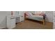 Charming bedroom with twin bed, desk, and carpet flooring at 15306 W Eureka Trl, Surprise, AZ 85374
