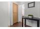 Bright hallway with built-in cabinet and small table at 15306 W Eureka Trl, Surprise, AZ 85374
