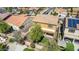 Aerial view of house with solar panels and a backyard at 16109 W Christy Dr, Surprise, AZ 85379