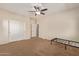 Bedroom with double door closet and metal bed frame at 16109 W Christy Dr, Surprise, AZ 85379