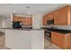 Modern kitchen with stainless steel appliances and granite countertops at 16109 W Christy Dr, Surprise, AZ 85379