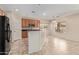 Kitchen features a breakfast bar, ample cabinet space, and tile flooring at 16109 W Christy Dr, Surprise, AZ 85379