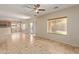 Living area with tile floors and access to backyard at 16109 W Christy Dr, Surprise, AZ 85379