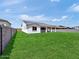 Backyard with block wall and lush lawn at 17815 W Denton Ave, Litchfield Park, AZ 85340