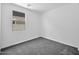 Bedroom with neutral carpet and bright window views at 17815 W Denton Ave, Litchfield Park, AZ 85340
