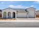Charming single-Gathering home with a three car garage, covered entry and low maintenance front yard at 17815 W Denton Ave, Litchfield Park, AZ 85340