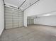 Spacious garage with two overhead doors at 17815 W Denton Ave, Litchfield Park, AZ 85340