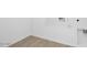 Laundry room with wood-look floors and washer/dryer hookups at 17815 W Denton Ave, Litchfield Park, AZ 85340