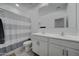 Clean bathroom with double vanity and shower at 19945 W Badgett Ln, Litchfield Park, AZ 85340