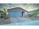 Modern single story home with a two-car garage at 19945 W Badgett Ln, Litchfield Park, AZ 85340