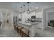 Open concept kitchen with stainless steel appliances and island at 19945 W Badgett Ln, Litchfield Park, AZ 85340