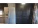 Kitchen boasts ample storage with dark cabinetry and white fridge at 201 S Greenfield Rd # 16, Mesa, AZ 85206