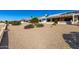 Gravel backyard with desert landscaping at 21214 N 124Th Ave, Sun City West, AZ 85375