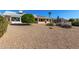 Landscaped backyard, view of patio at 21214 N 124Th Ave, Sun City West, AZ 85375