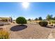 Landscaped backyard with a citrus tree at 21214 N 124Th Ave, Sun City West, AZ 85375