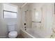 Bathroom with bathtub and window at 21214 N 124Th Ave, Sun City West, AZ 85375