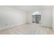 Well-lit bedroom with arched window at 21214 N 124Th Ave, Sun City West, AZ 85375