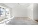 Bright bedroom with large windows and golf course view at 21214 N 124Th Ave, Sun City West, AZ 85375