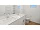 Bright bathroom with double sink vanity, tile flooring, shower and toilet at 22551 W Pontiac Dr, Surprise, AZ 85387