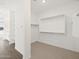 Walk in closet with carpet and hanging racks at 22551 W Pontiac Dr, Surprise, AZ 85387