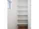 A spacious closet with custom shelving for optimal storage solutions at 22551 W Pontiac Dr, Surprise, AZ 85387