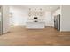 Spacious open kitchen featuring a center island and stainless appliances at 22551 W Pontiac Dr, Surprise, AZ 85387