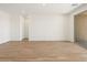 Open concept living area featuring recessed lights and wood-look tile at 22551 W Pontiac Dr, Surprise, AZ 85387