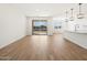 Spacious open-concept living area with backyard access and views at 22551 W Pontiac Dr, Surprise, AZ 85387
