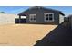 Backyard with a dirt lot and block fence at 22563 W Pontiac Dr, Surprise, AZ 85387