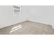 Bedroom with natural light and neutral carpet at 22563 W Pontiac Dr, Surprise, AZ 85387