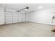 Two-car garage with storage space at 22563 W Pontiac Dr, Surprise, AZ 85387