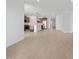 Open-concept view into kitchen with stainless appliances, island and granite countertops at 22563 W Pontiac Dr, Surprise, AZ 85387