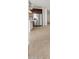 Kitchen with stainless steel refrigerator, granite countertops, and decorative pendant lights at 22563 W Pontiac Dr, Surprise, AZ 85387